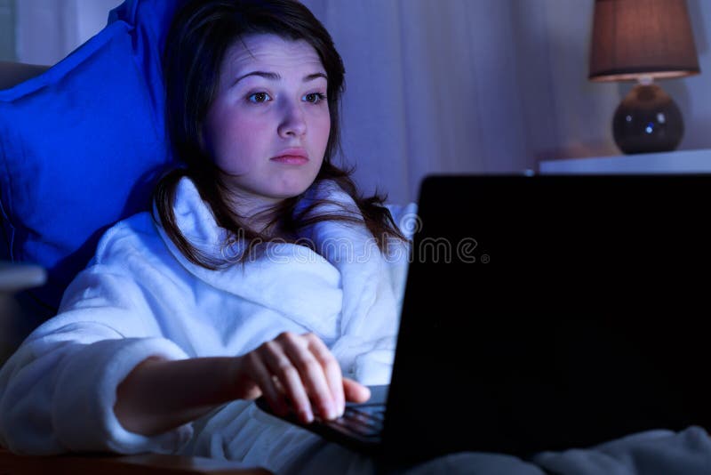 Girl addicted to computer surfing on the internet. Girl addicted to computer surfing on the internet