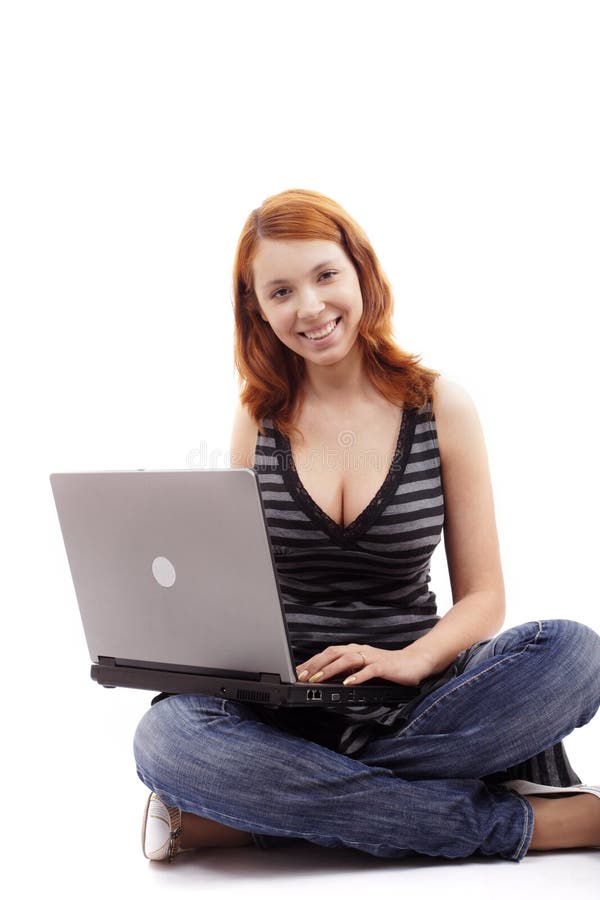Ragazza e computer portatile fotografie stock Ragazza e computer portatile fotografie stock