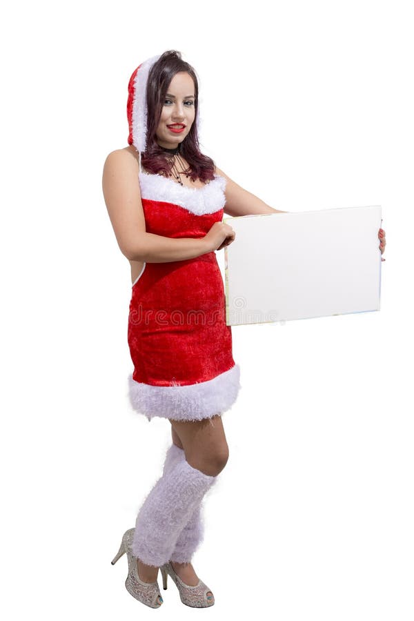 Ragazza egiziana di Natale del bello assistente di Santa con l'insegna fotografia stock libera da diritti Ragazza egiziana di Natale del bello assistente di Santa con l'insegna fotografia stock libera da diritti