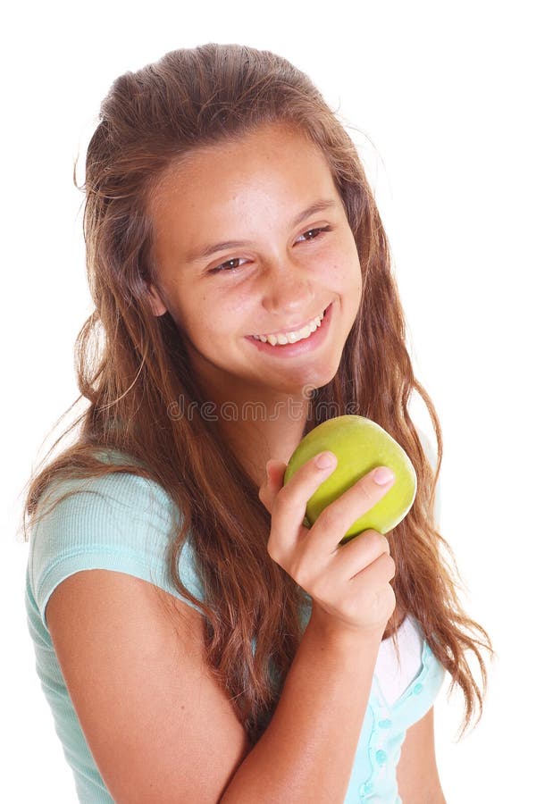 Ragazza teenager con la mela fotografia stock libera da diritti Ragazza teenager con la mela fotografia stock libera da diritti