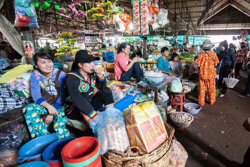 Koh Kong, Cambodia â€“ MARCH 10, 2011: Vendor Khmer girls at the local market. Koh Kong Province. Koh Kong, Cambodia â€“ MARCH 10, 2011: Vendor Khmer girls at the local market. Koh Kong Province.