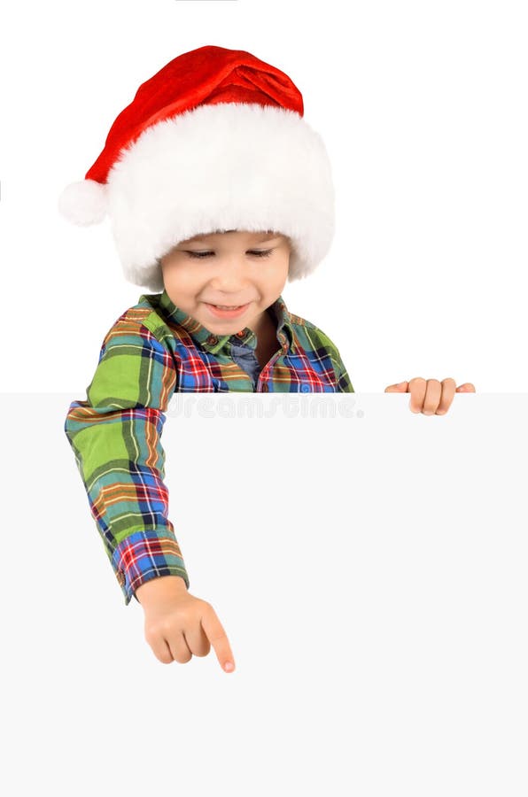 Ragazzo in cappello della Santa con la scheda in bianco fotografia stock Ragazzo in cappello della Santa con la scheda in bianco fotografia stock