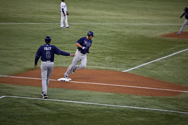 TORONTO â€“ MAY 19: Tampa Bay Rays' player Johnny Damon rounds third in a MLB game against the Toronto Blue Jays at Rogers Centre on May 19, 2011 in Toronto. The Blue Jays won 3-2. TORONTO â€“ MAY 19: Tampa Bay Rays' player Johnny Damon rounds third in a MLB game against the Toronto Blue Jays at Rogers Centre on May 19, 2011 in Toronto. The Blue Jays won 3-2