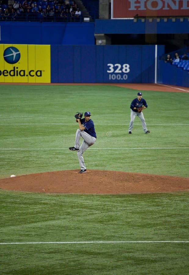 TORONTO â€“ MAY 19: Tampa Bay Rays' player Juan Cruz pitching in a MLB game against the Toronto Blue Jays at Rogers Centre on May 19, 2011 in Toronto. The Blue Jays won 3-2. TORONTO â€“ MAY 19: Tampa Bay Rays' player Juan Cruz pitching in a MLB game against the Toronto Blue Jays at Rogers Centre on May 19, 2011 in Toronto. The Blue Jays won 3-2.