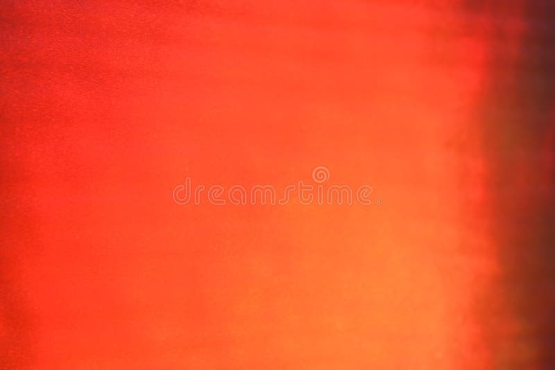 Raggio luminoso di pendenza dell'estratto di struttura arancio del fondo