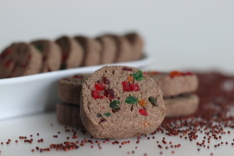 Ragi wheat cookies. Tutti fruity finger millet cookies. A healthy version of cookies made of finger millet flour instead of all