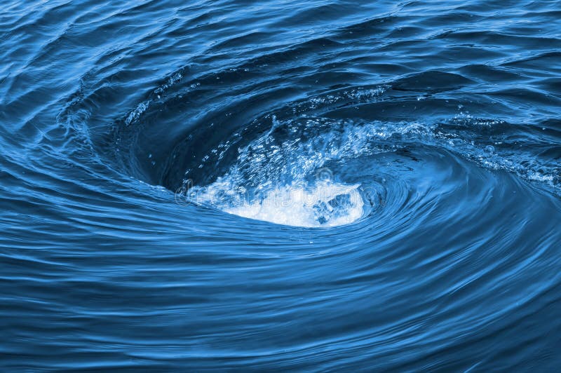 The huge raging whirlpool on a river surface. Whirlpool vortex water stock images, royalty-free photos and pictures