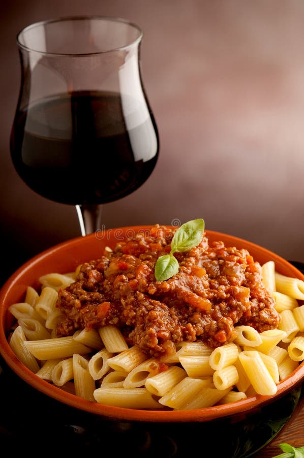 Ragu pasta and red wine stock image. Image of feasting 12752047
