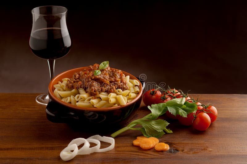 Ragu pasta and red wine stock image. Image of feasting 12752047