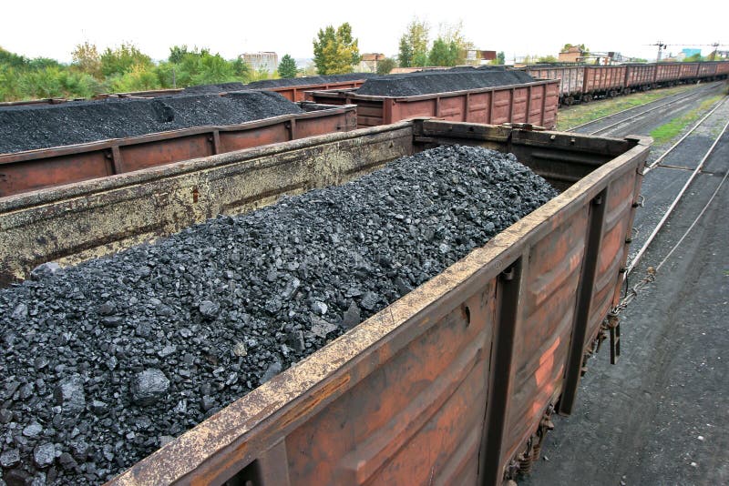 Rail cars loaded with coal stock photo. Image of green 81695102