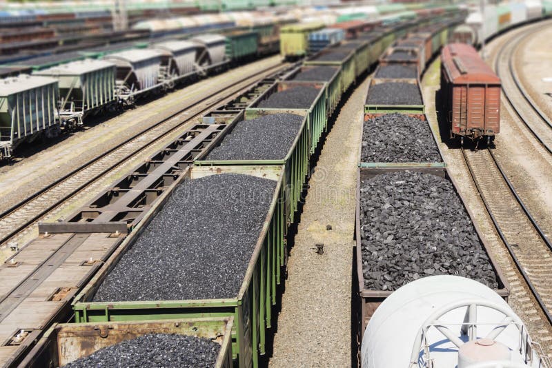 Rail Cars Loaded with Coal, a Train Transports Coal. Many Different