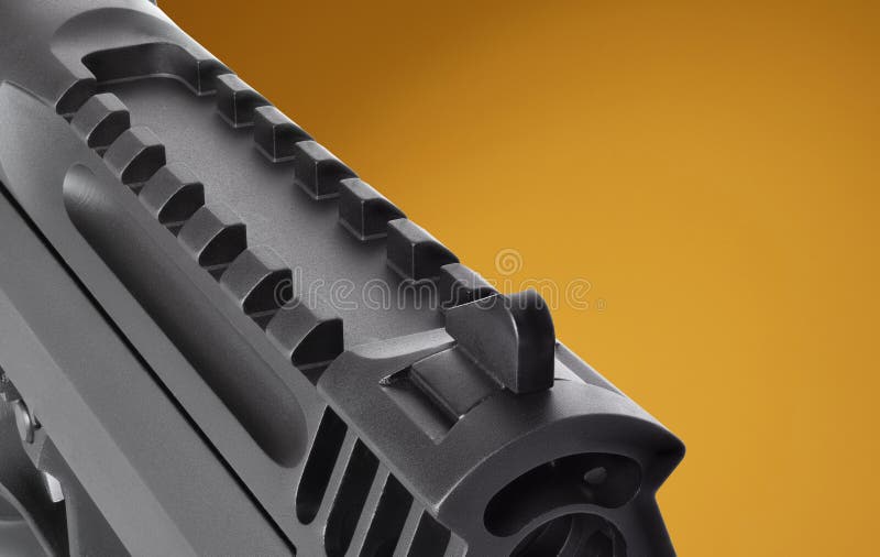 Rail and front sight on a big pistol royalty free stock image
