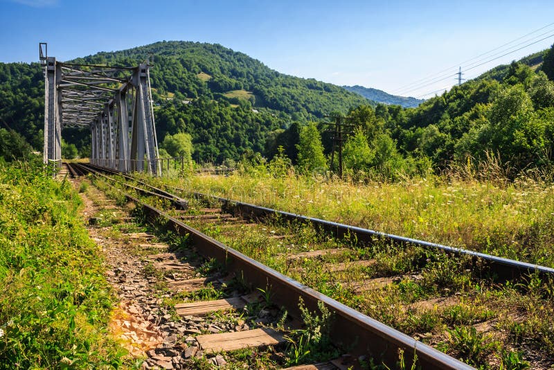 Rail metal bridge in mountains