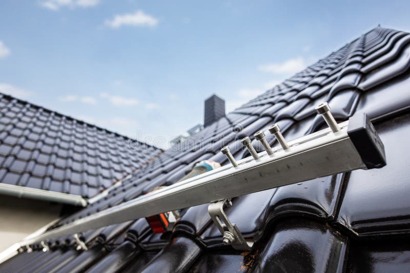 Rail for Solar Panel Mounting System on a Tiled Roof Stock Image ...