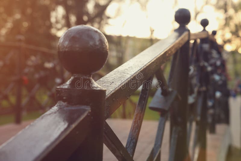 Railing bridge over the river close-up with a blurred background royalty free stock photo