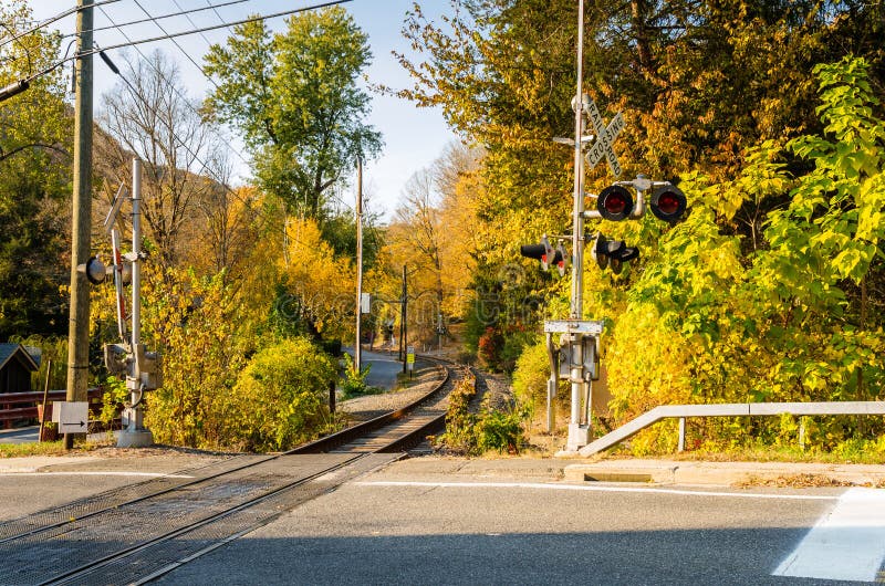 Railroad Crossing with Levels up ona Sunny Autumn Day