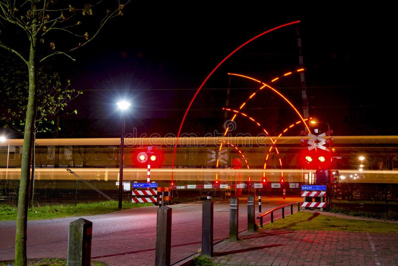 Railroad crossing at night stock photography Railroad crossing at night stock photography
