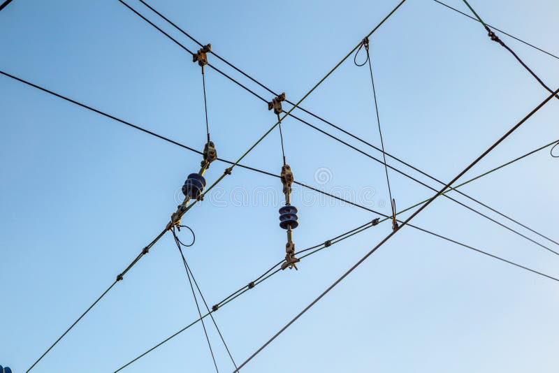 Railroad overhead lines against clear blue sky royalty free stock photos