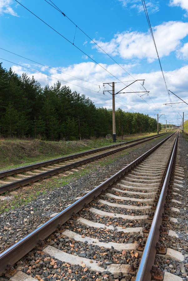 Railway with electric cables royalty free stock photography