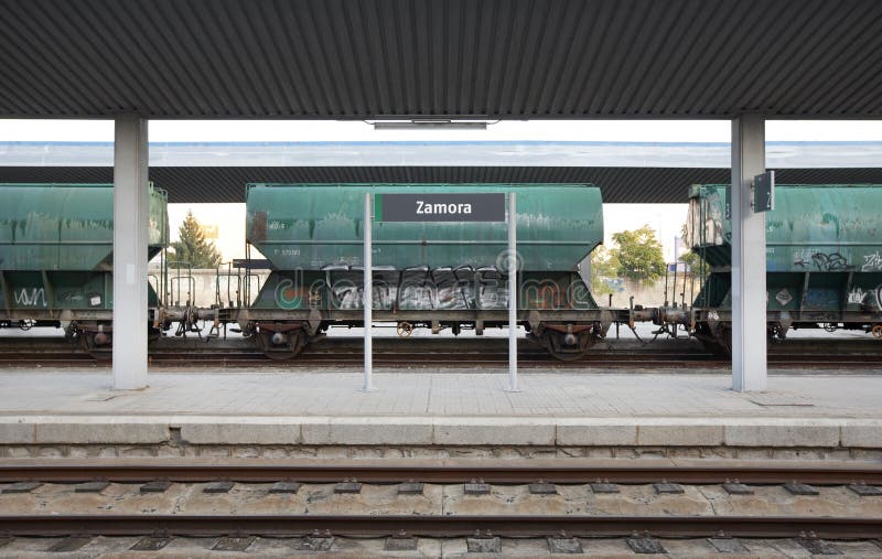 Railway station with freight wagons and rails royalty free stock image