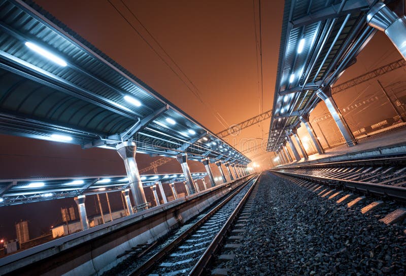 Railway station at night. Train platform in fog. Railroad in Donetsk. Night train stock images, royalty-free photos and pictures