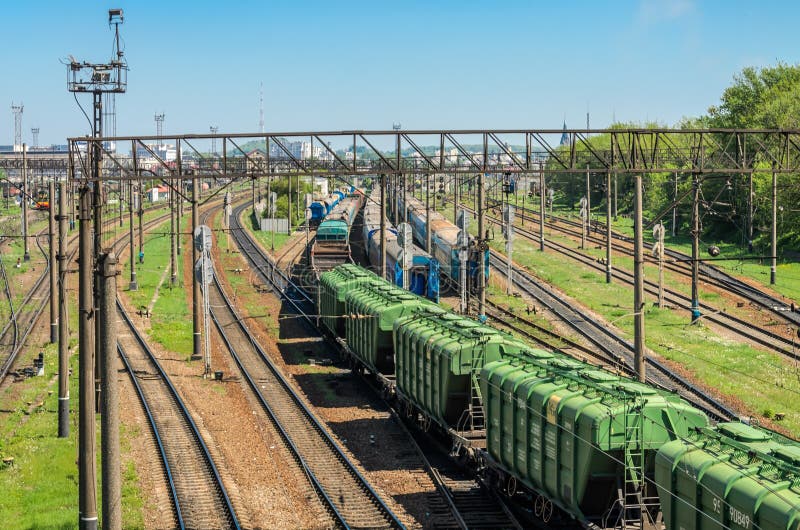 LVIV, UKRAINE - APRIL 2018: The railway station on which there are many freight trains and wagons royalty free stock photo LVIV, UKRAINE - APRIL 2018: The railway station on which there are many freight trains and wagons royalty free stock photo