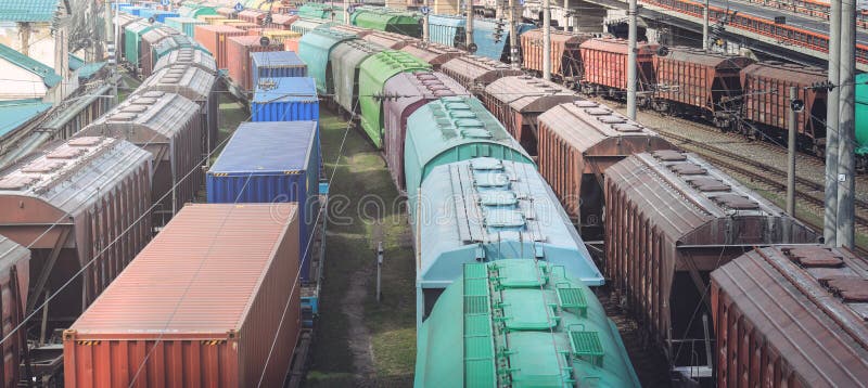 Railway wagons with cargo of metal and grain in port of Odessa. trains are waiting in line for loading at cargo terminal. stock photos Railway wagons with cargo of metal and grain in port of Odessa. trains are waiting in line for loading at cargo terminal. stock photos