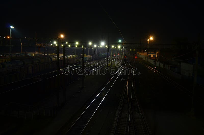 Railways Theme: Night at Railroad Station Stock Image - Image of ...