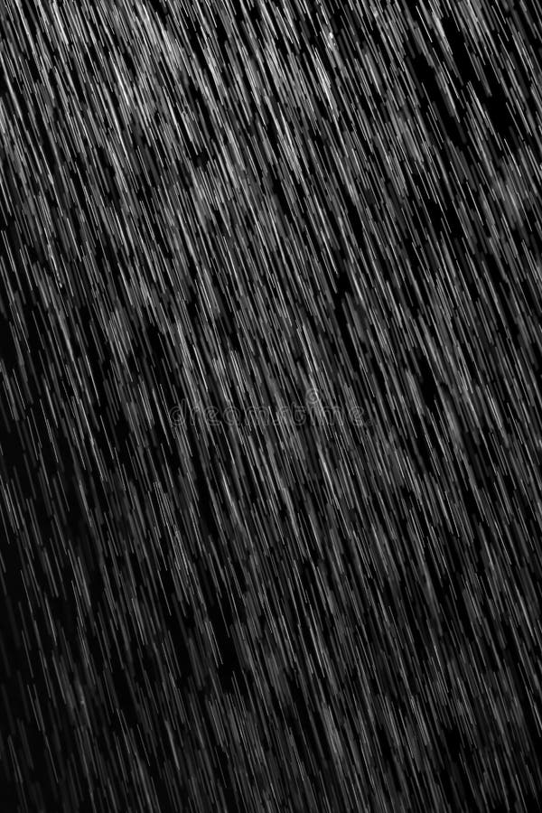 Rain on a black background stock photo. Image of raindrops 110114786