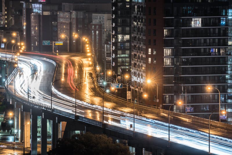 Rain comes down on urban lighted expressway in Toronto, Ontario Canada. stock images Rain comes down on urban lighted expressway in Toronto, Ontario Canada. stock images