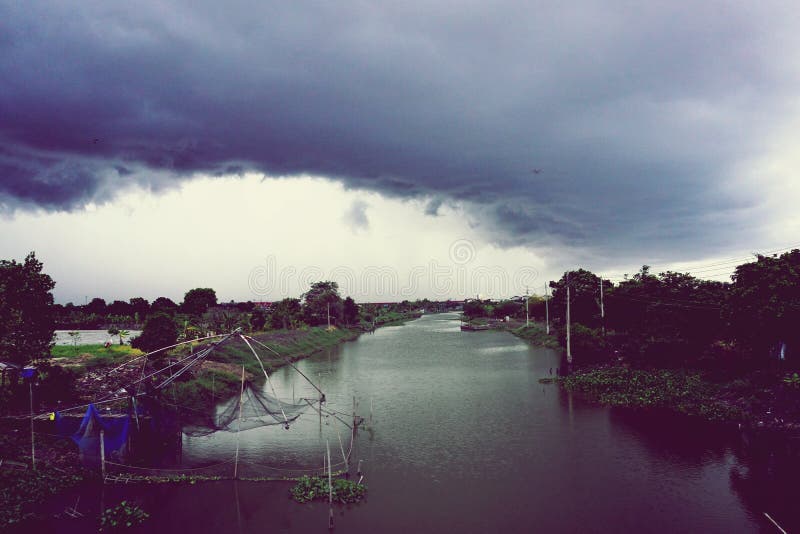 Rain coming soon stock image. Image of fishery, canal 65114353