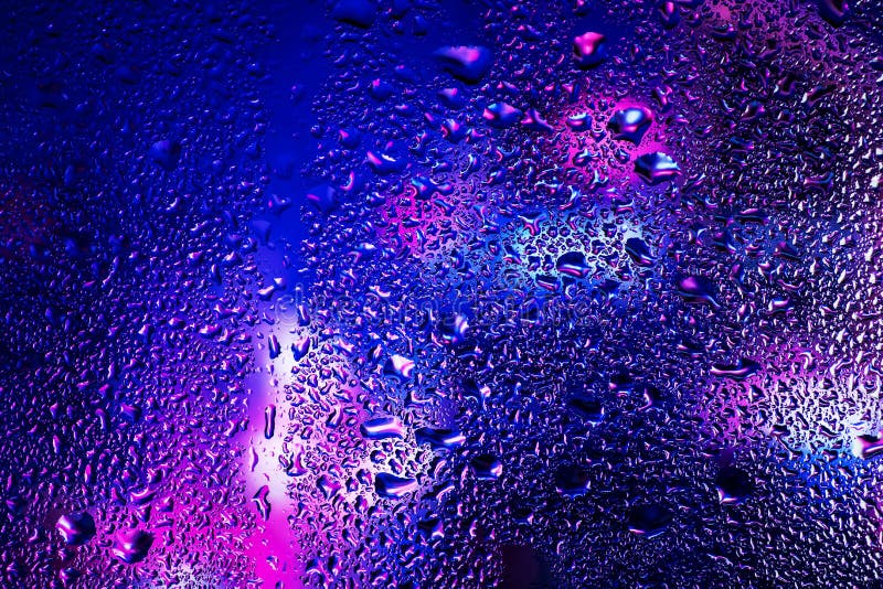 Rain Drops and Condensation on the Window Glass Against the Background ...