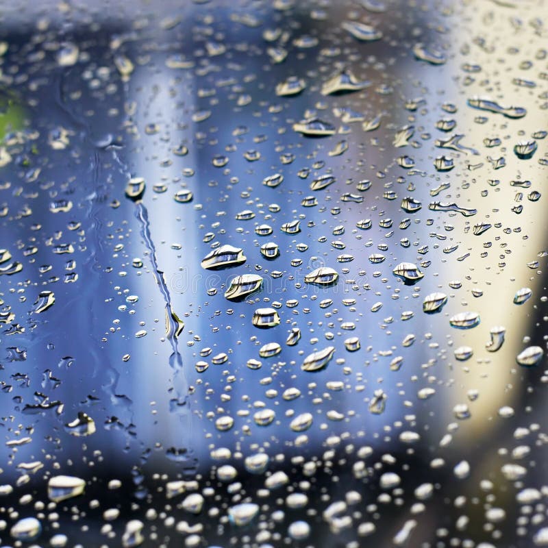 Rain drops on window during a stormy evening (shallow dof). Window color reflection background stock images, royalty-free photos and pictures