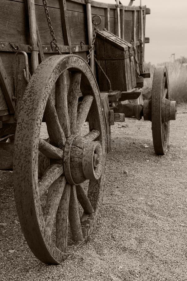 Rain spattered covered wagon in sepia