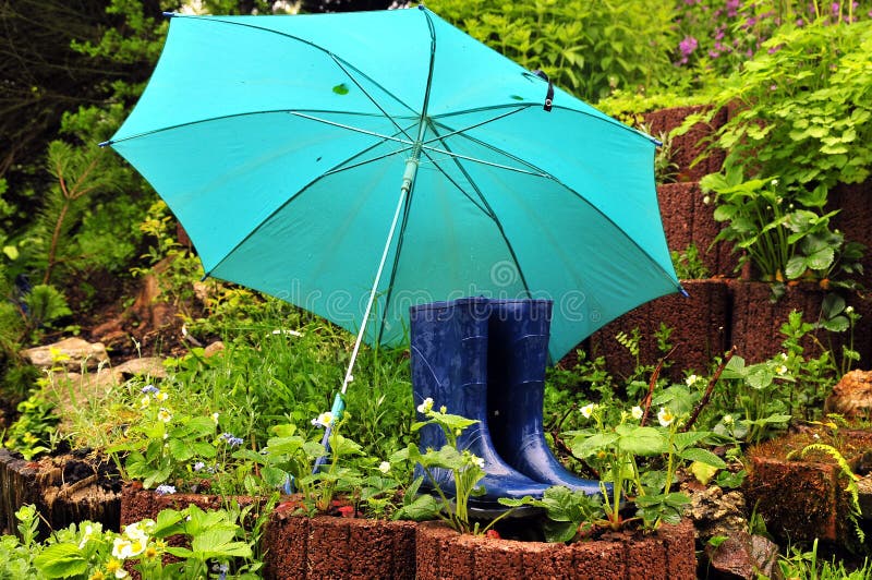 Rain umbrella rubber boots stock photo. Image of rubber 19963652