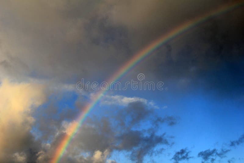 Rainbow across stormy skies