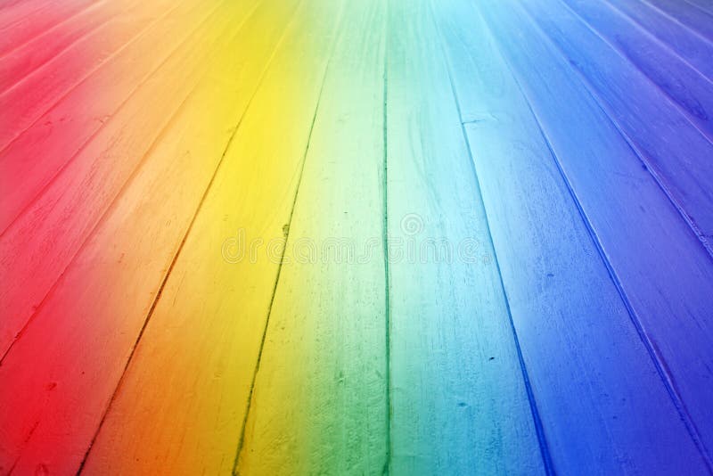 A rainbow background made of wood as seen from a low angle. A rainbow background made of wood as seen from a low angle.