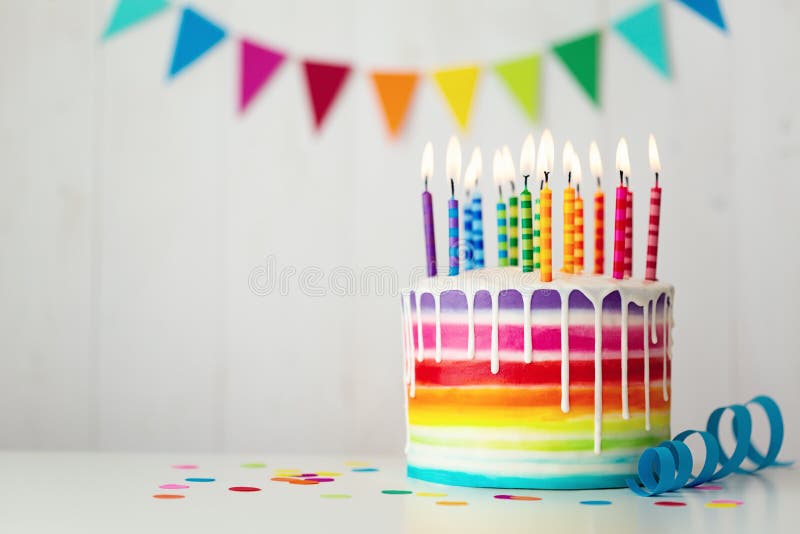 Rainbow birthday cake with candles
