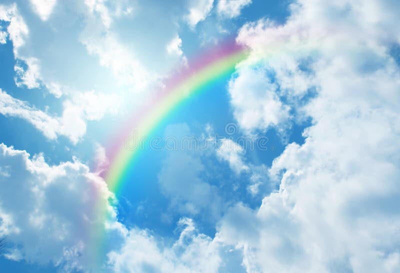 Rainbow in blue sky