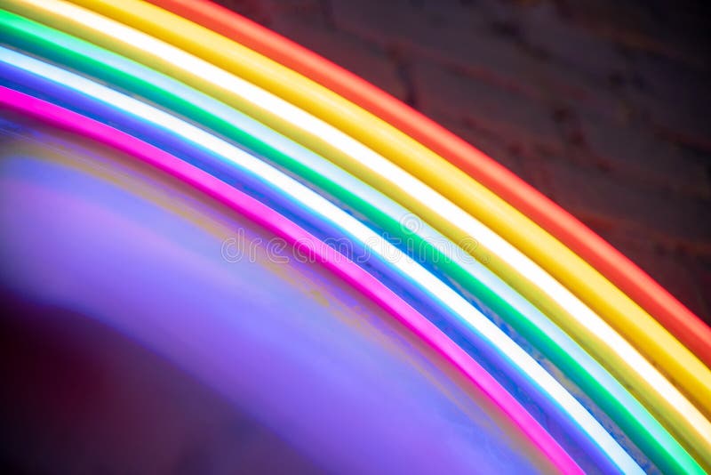 Rainbow colors neon background, abstract festive modern vibrant texture stock photo