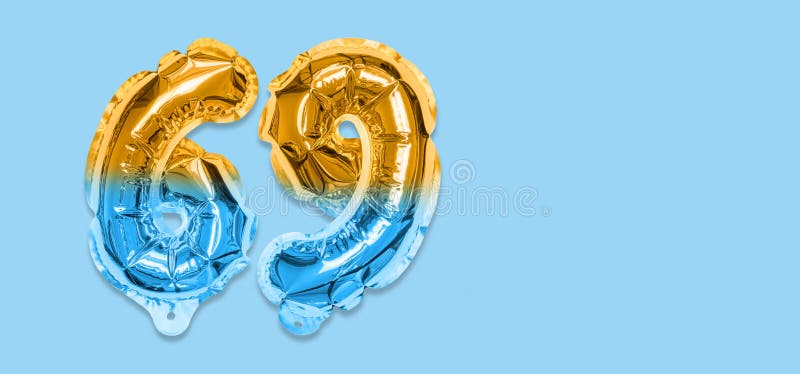 Rainbow Foil Balloon Number, Digit Sixty Nine on a Blue Background ...
