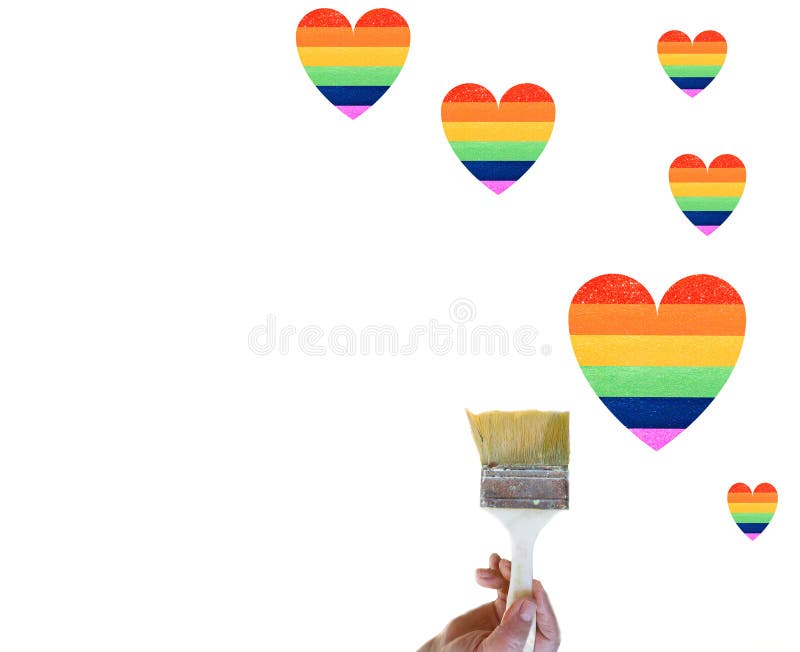 Rainbow Heart Shape.Lgbt rights concept. Human Hand painting a heart like a LGBT flag isolated on white background.