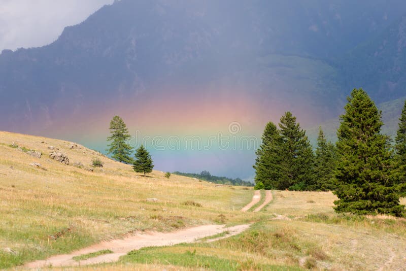 Rainbow in mountains