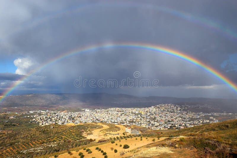 Rainbow over Cana of Galilee after rain, Israel