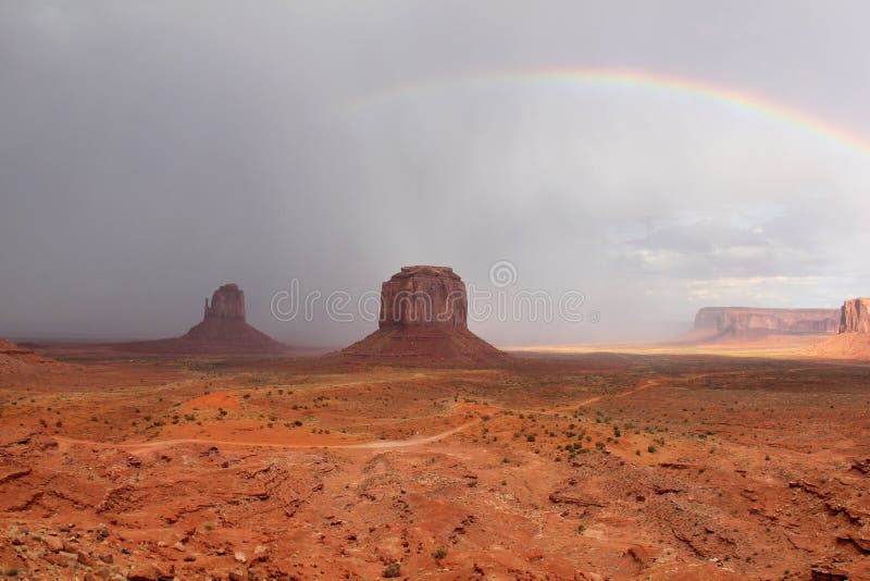 Rainbow and Passing Storm - Monument Valley, AZ