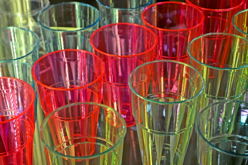 Rainbow plastic glasses pack closeup, colorful manufacture diversity, stock images Rainbow plastic glasses pack closeup, colorful manufacture diversity, stock images