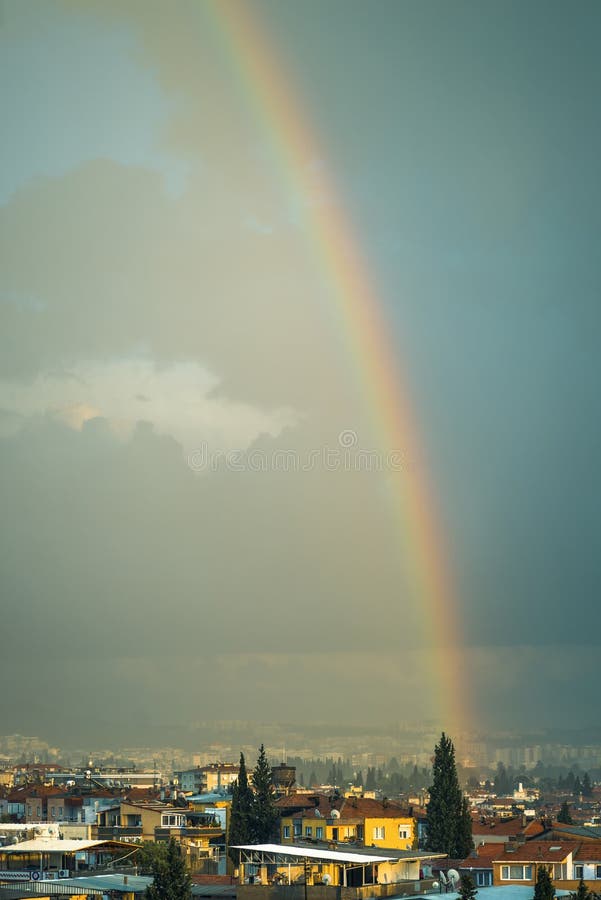 Rainbow after the rain. stock photo. Image of scene, downtown 77632918