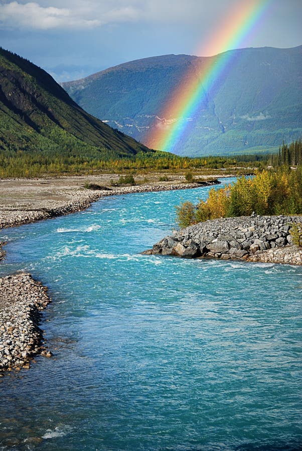 Nice rainbow on a blue river, BC, Canada. Nice rainbow on a blue river, BC, Canada