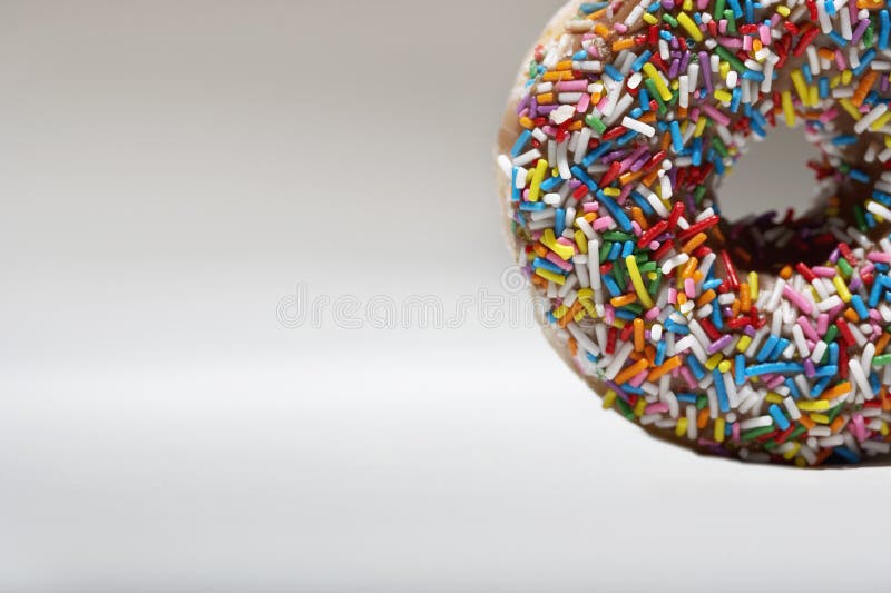 Download Sprinkles Doughnut stock photo. Image of yellow, confection - 33094360