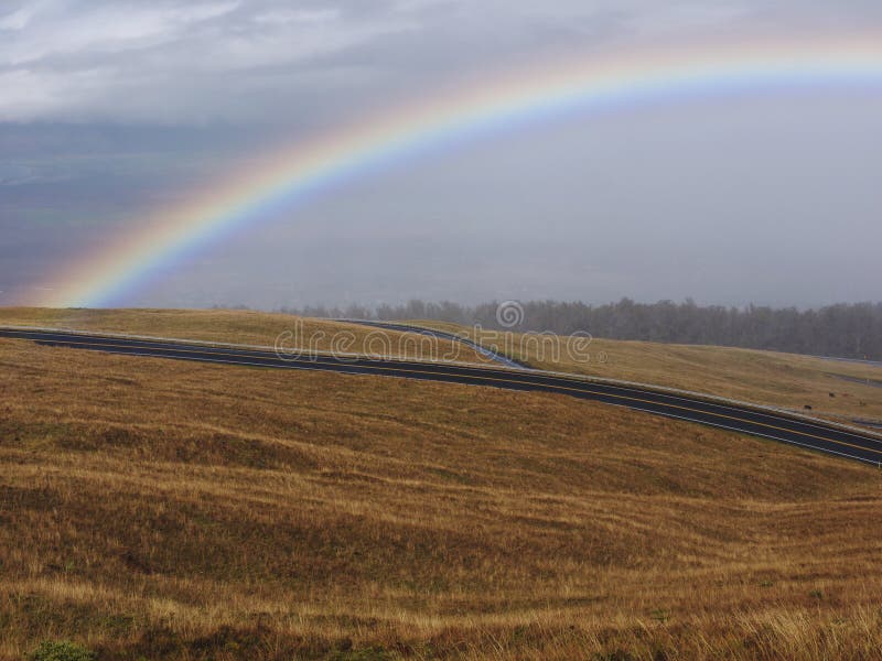 Rainbow and stormy clouds royalty free stock photo Rainbow and stormy clouds royalty free stock photo